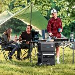 Anker F2600 GaNPrime Powerstation in outdoor use powering multiple devices during camping and BBQ
